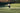 woman playing tennis with best tennis racket on outdoor court
