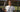 Woman holding Mantis tennis racket on outdoor court promoting buying a tennis racket guide