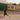 Male tennis player hitting a serve on outdoor court during professional tennis circuit