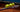 Tennis racket with multiple tennis balls balanced on the strings on a clay court background