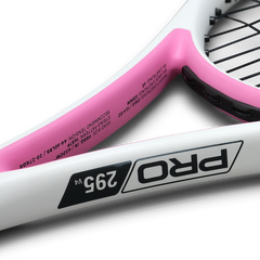 Close-up of a white and pink junior tennis racket frame displaying the model name "PRO 295 v4" and specifications on the inner throat.