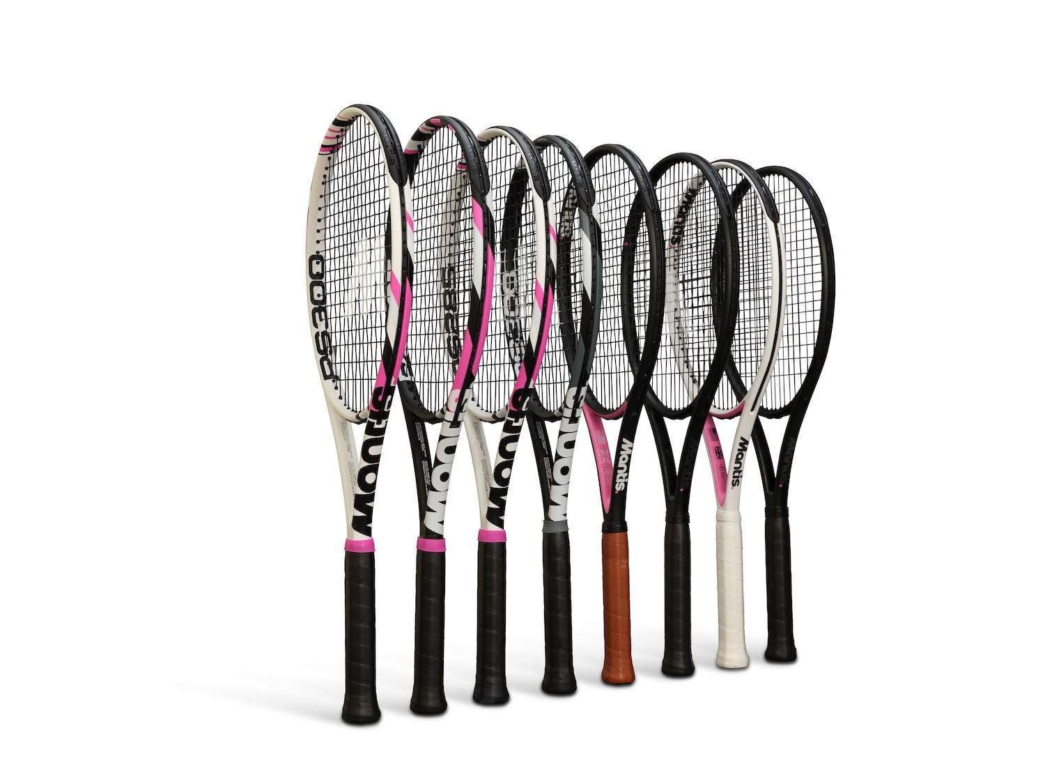 Set of various carbon fibre tennis rackets with black grips and mixed color frames arranged in a row on white background