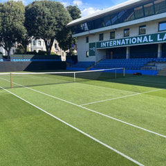 empty tennis court at International Lawn tennis club perfect for online tennis instruction training