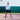 Tennis player practicing topspin technique during a focused training session at a club court