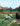 tennis player performing fitness training with agility ladder drills and resistance exercises on court