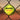 Mantis all court tennis ball stuck in chain-link fence close-up showing bright yellow felt and logo detailing