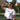 Tennis player executing a slice serve with sidespin technique on court